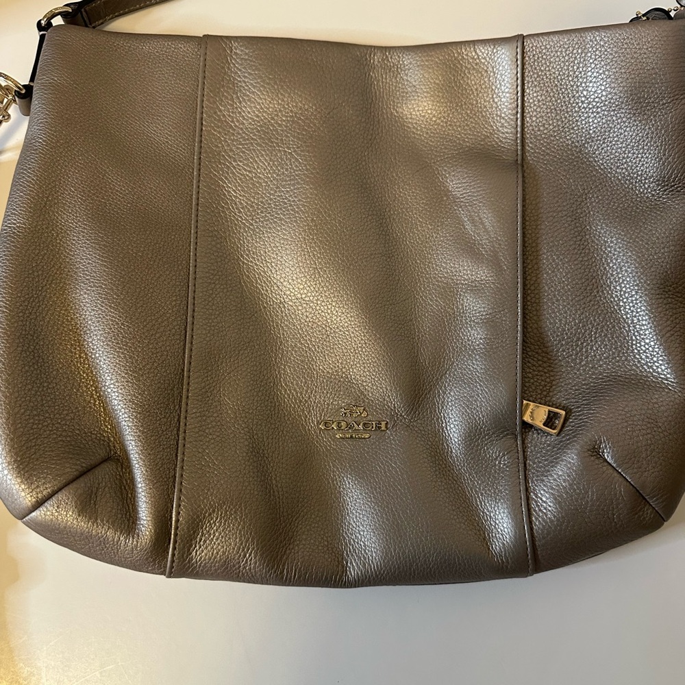 Coach leather Metallic silver Crossbody Bag.